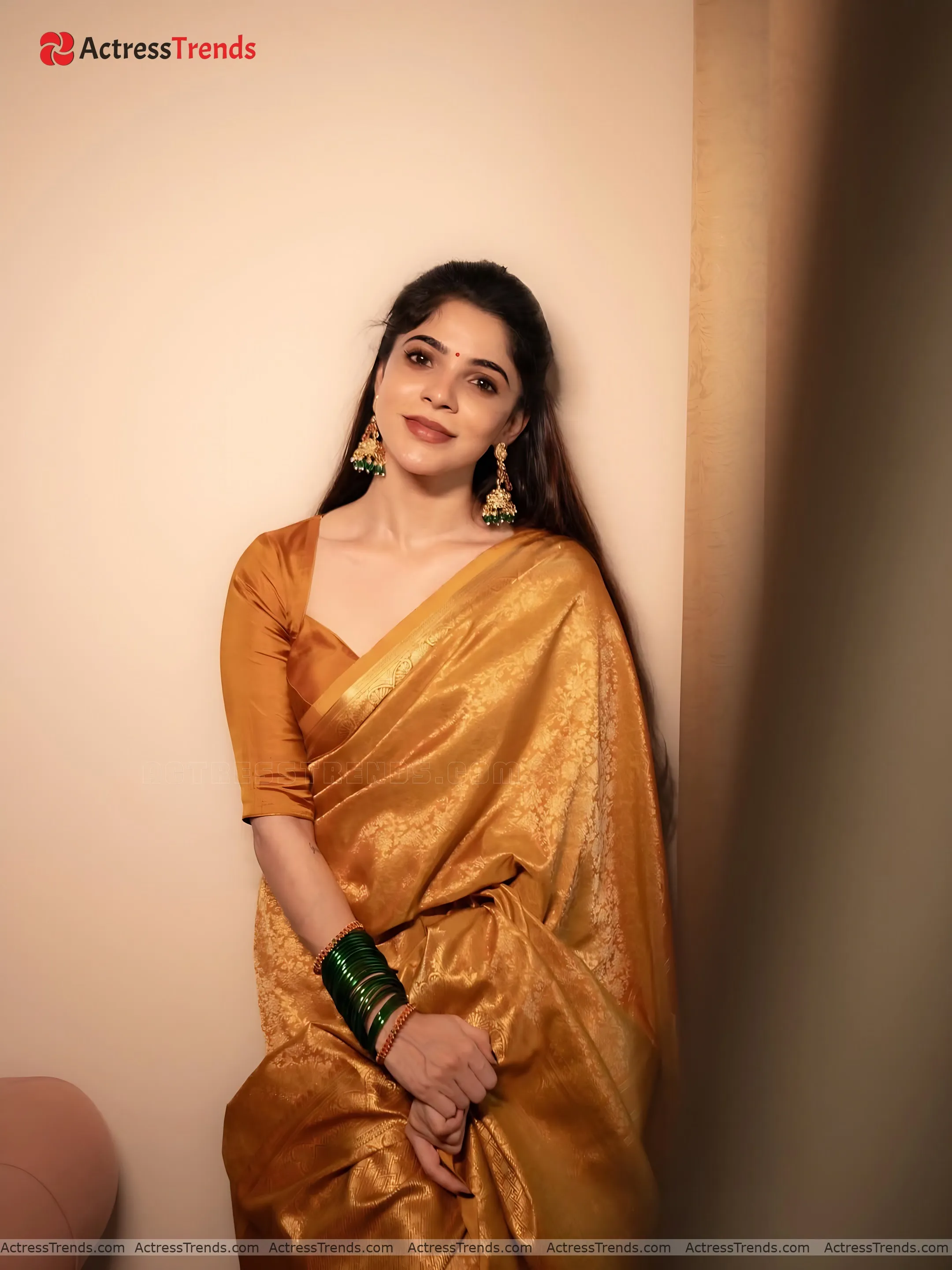 Divya Bharathi Gold Saree Beautiful Face Glamorous Actress Orange Dress