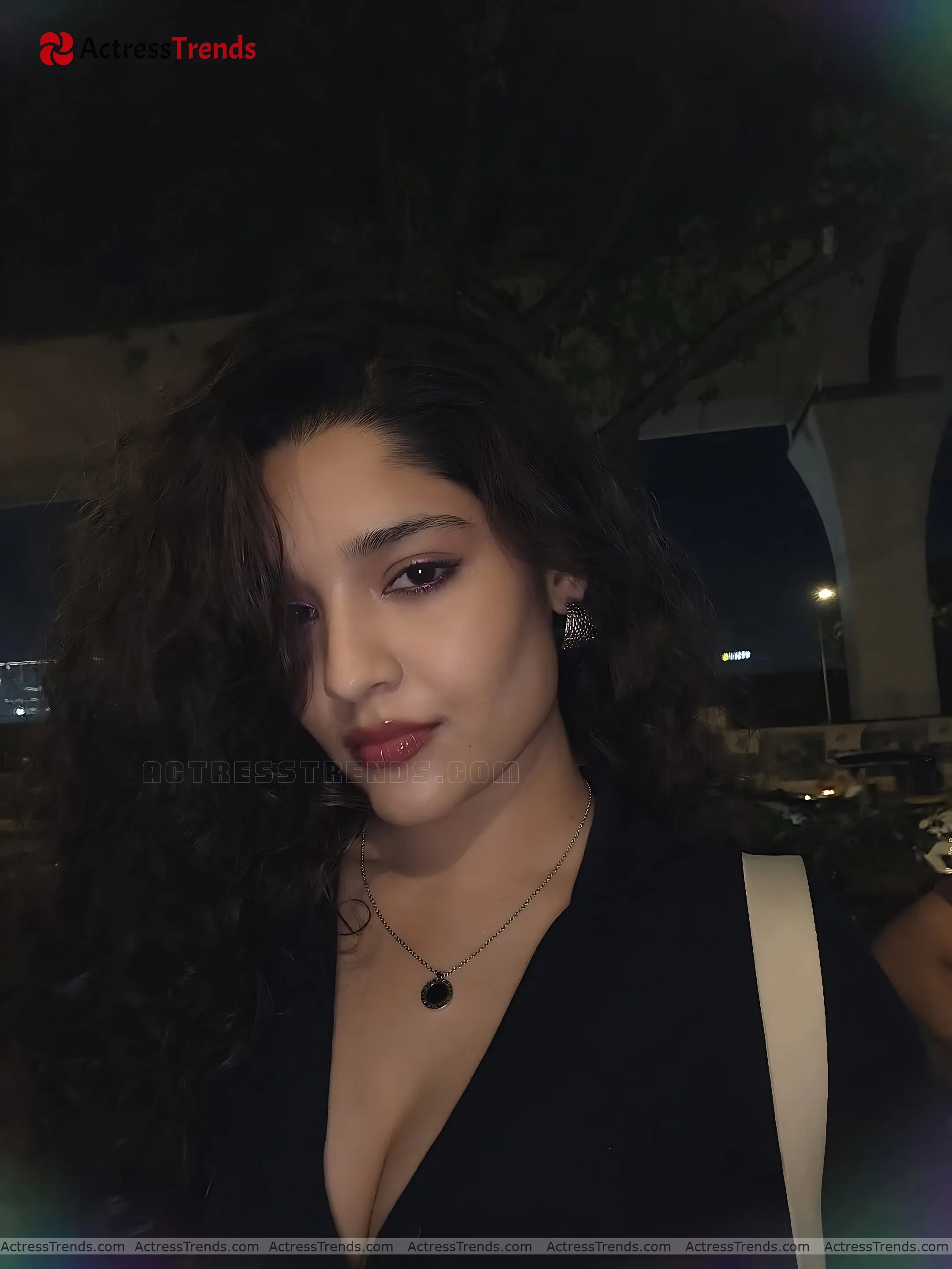 Ritika Singh Black Dress Sensual Portrait Smoky Eyes Cleav Pose
