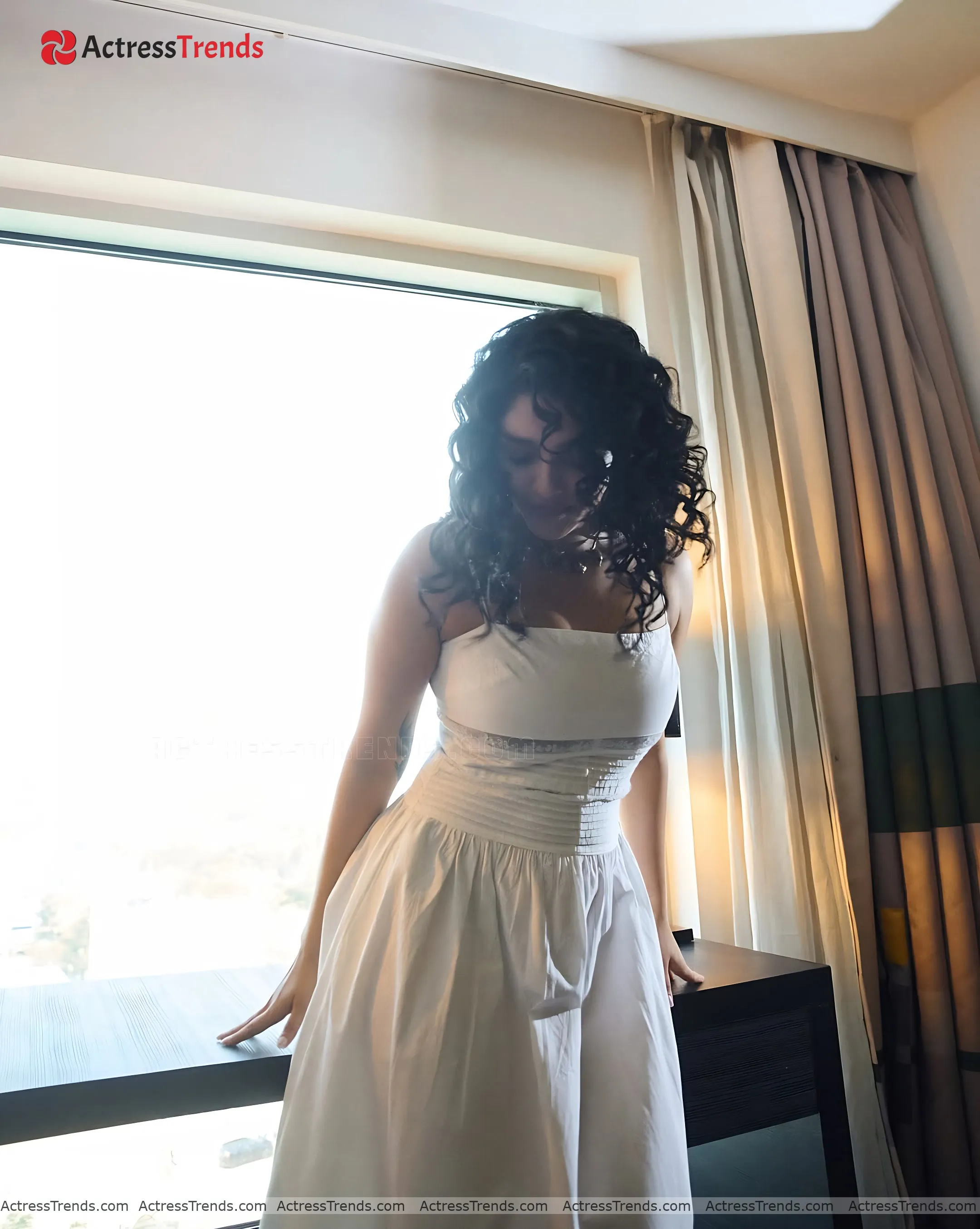 Ritika Singh White Dress Cleav Pose