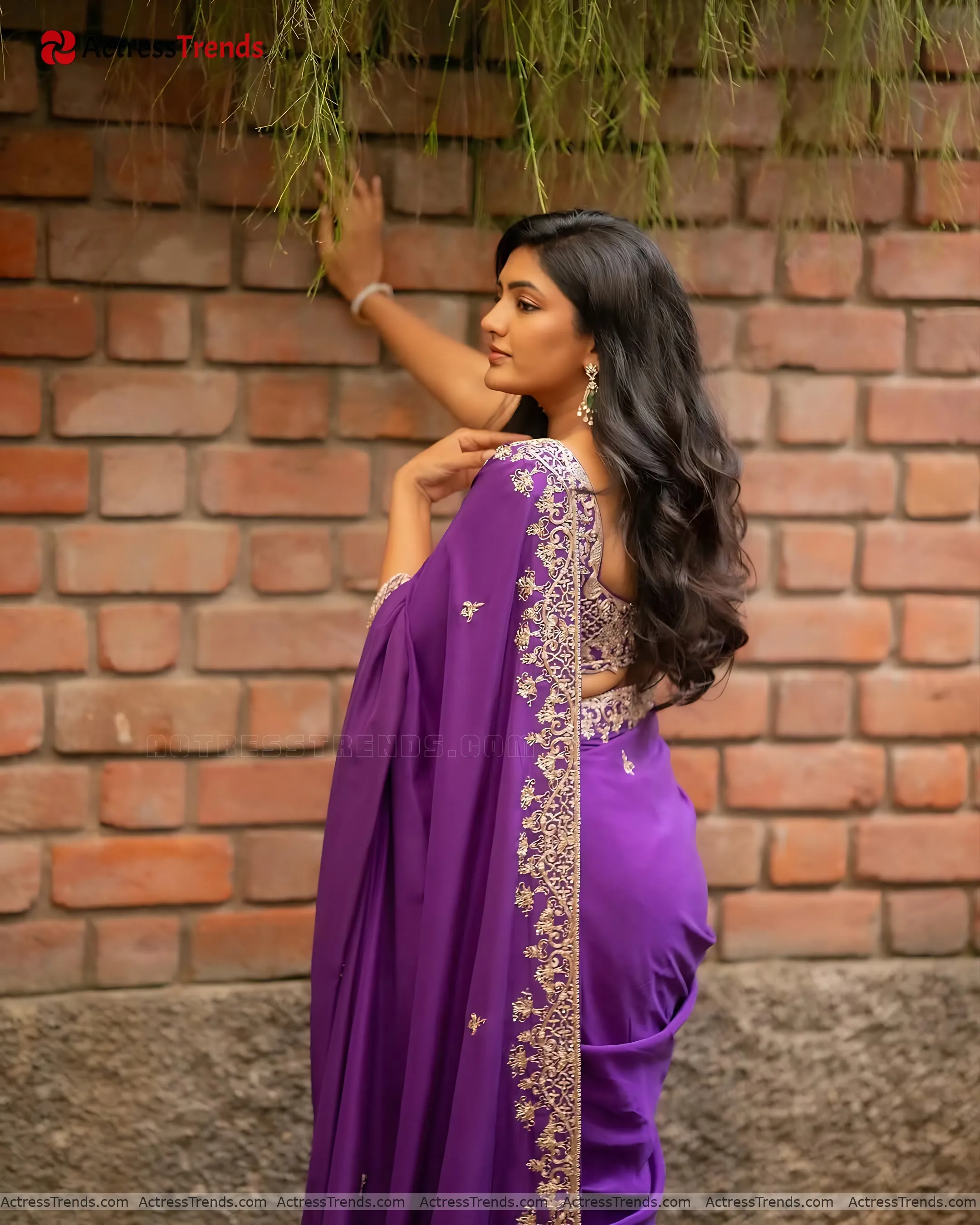 Eesha Rebba Purple Saree Back Pose Bold Style